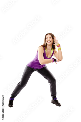 Young athletic woman doing dance moves