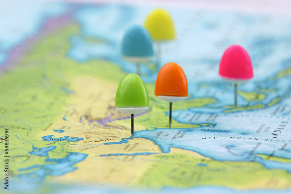 Naklejka premium Thumb tacks on Asia map