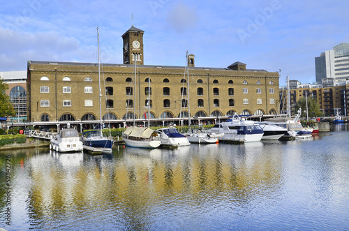 St Katharine dock in London. Yacht  pier near Tower Bridge photo