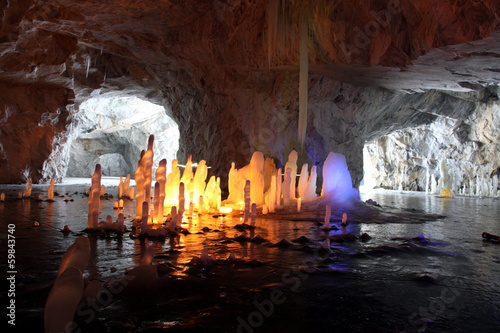 Stalagmite in deep marble cave, Russia
