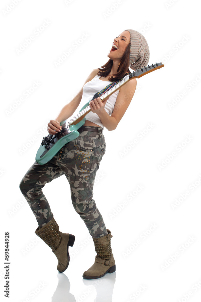 Beautiful young woman playing a guitar and singing Beautiful young woman playing a guitar and singing