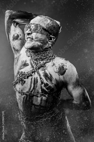 Bdsm, Slave concept, man bound, chains, prison © Fernando Cortés