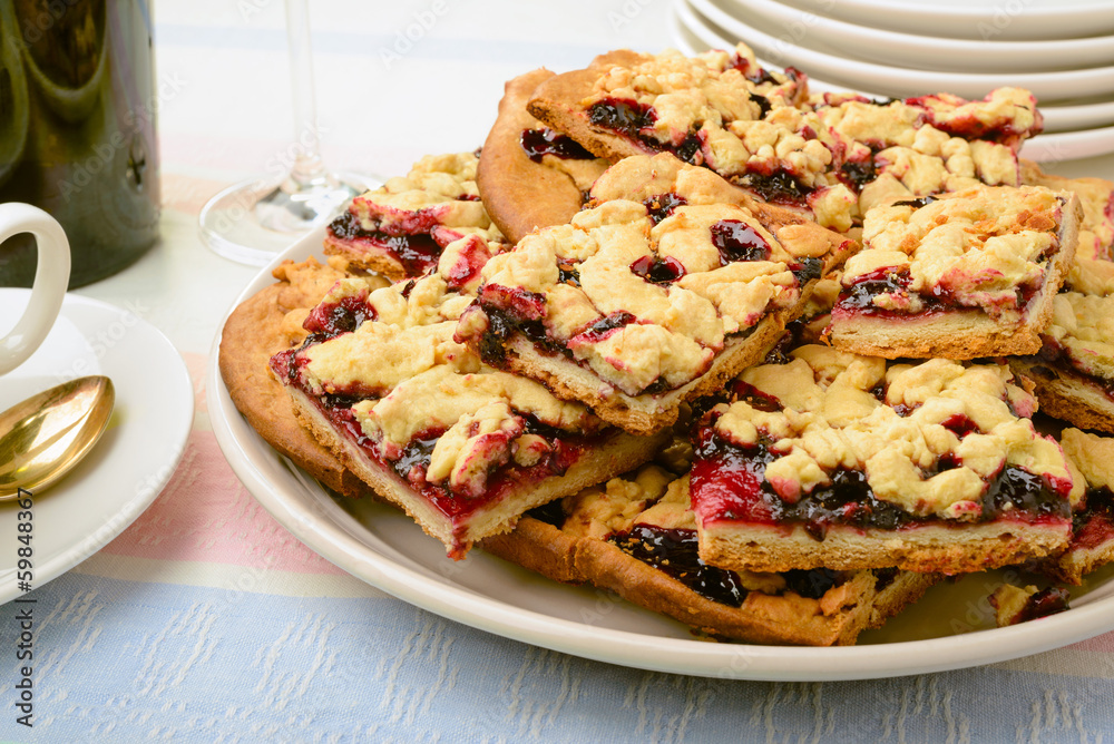 Closeup on pieces of blackberry jam grated pie Closeup on pieces of blackberry jam grated pie