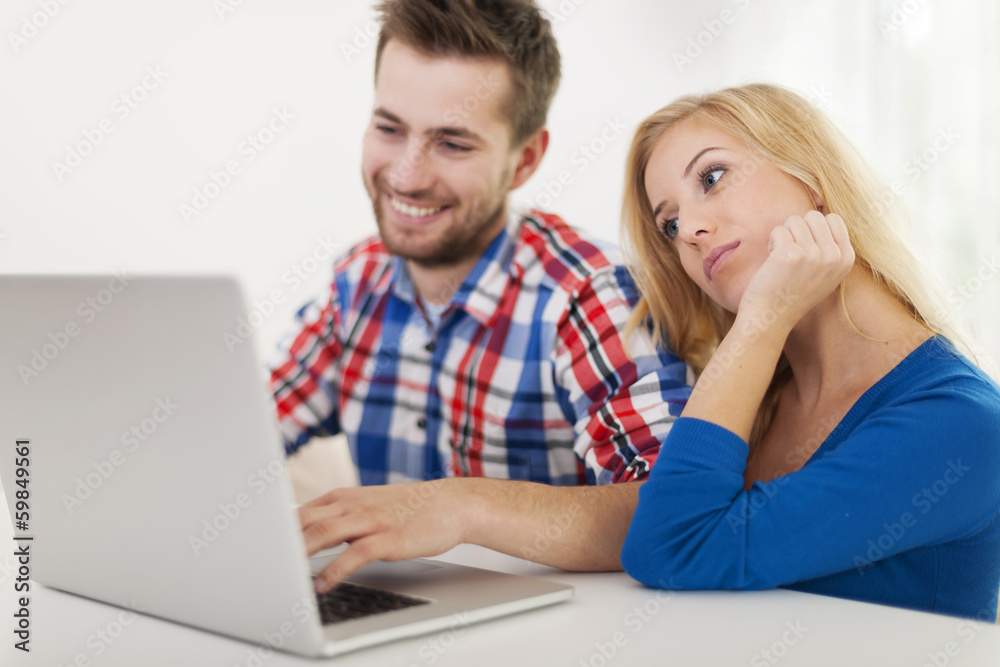 Portrait of couple with contemporary laptop Portrait of couple with contemporary laptop