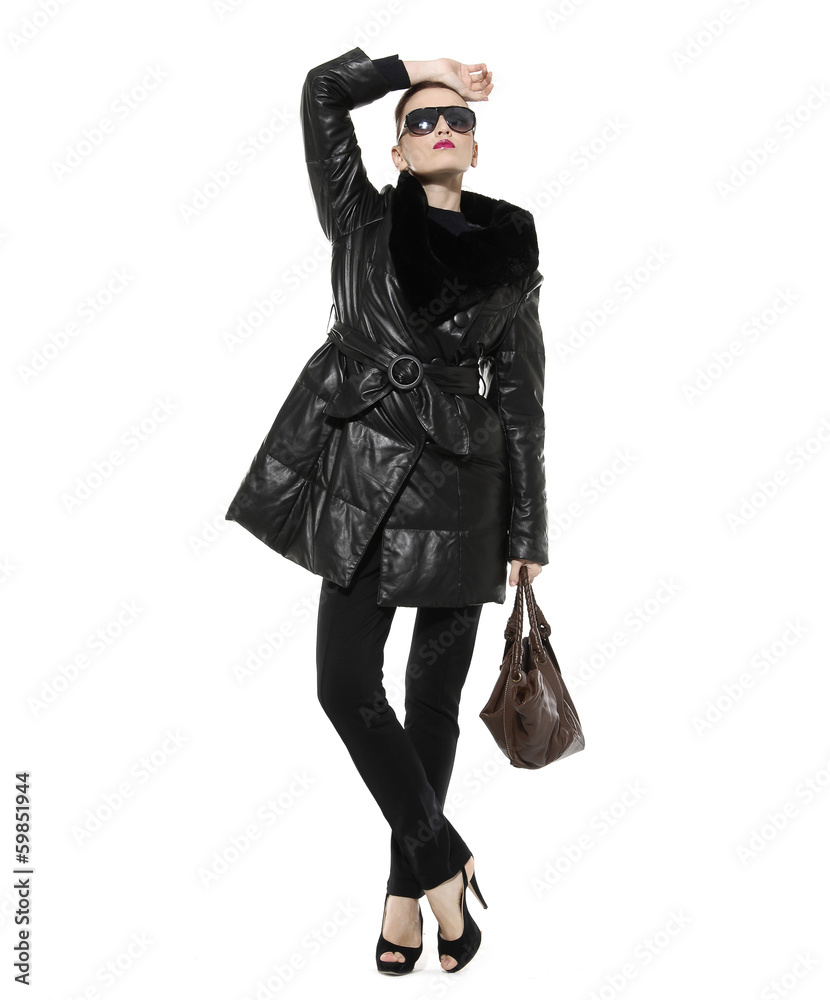 Full length portrait of a beautiful woman in coat with bag Full length portrait of a beautiful woman in coat with bag