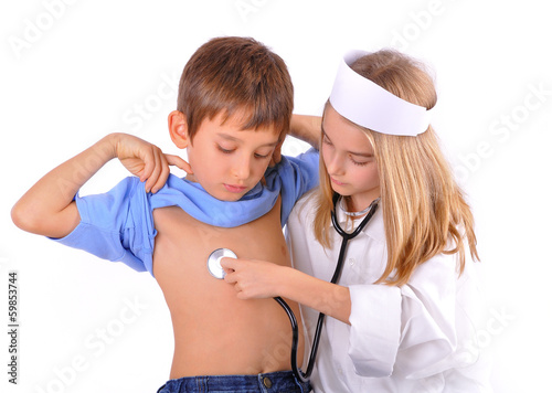 Kids-brother and sister playing doctor