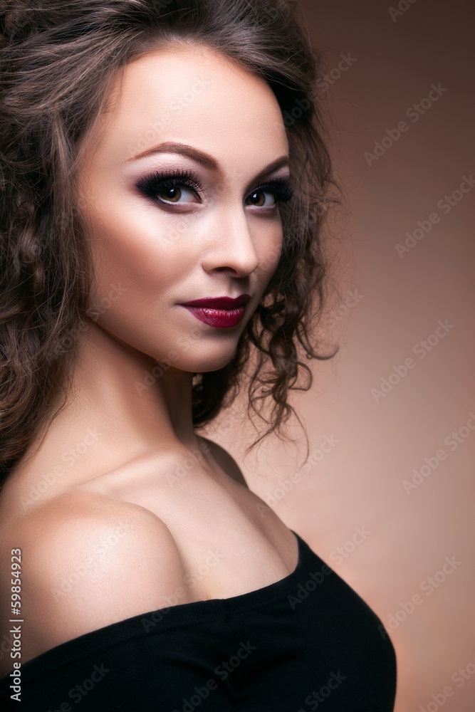 Sensual woman on brown background professional make up Sensual woman on brown background professional make up