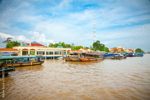 Tourist port is  tp. My Tho in Mekong, Vietnam. photo
