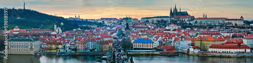 Panoramic winter view of Prague on the sunset