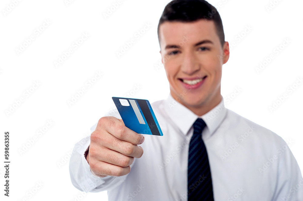 Businessman displaying his cash card Businessman displaying his cash card