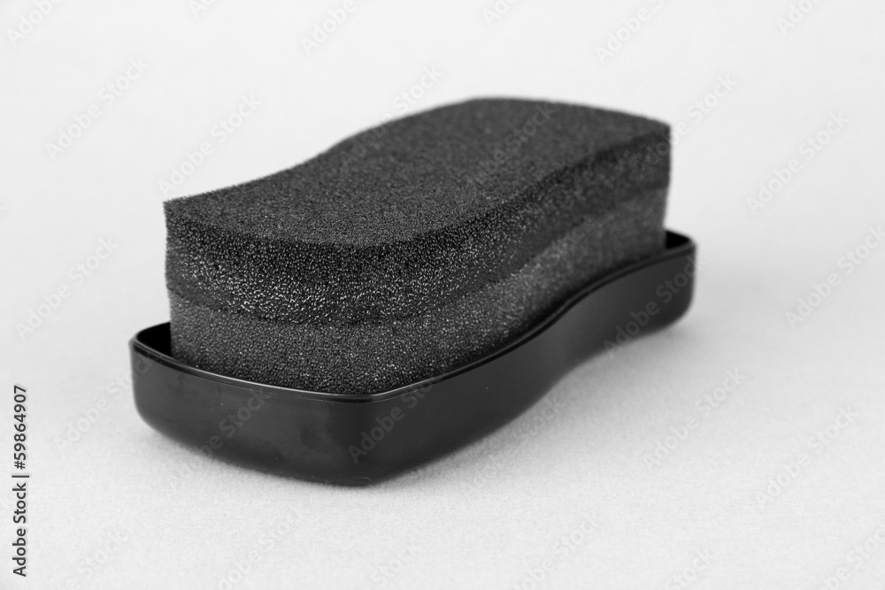 Shoe shine sponge, on color background Shoe shine sponge, on color background