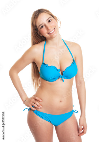 Stehende Frau im blauen Bikini