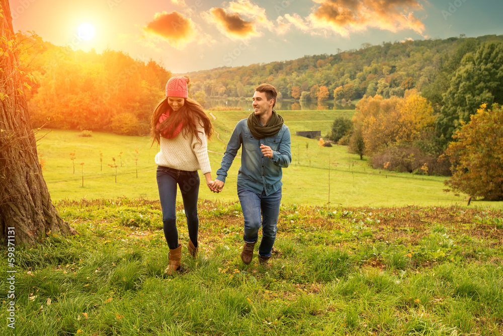 Young couple running on the beautiful scenery Young couple running on the beautiful scenery