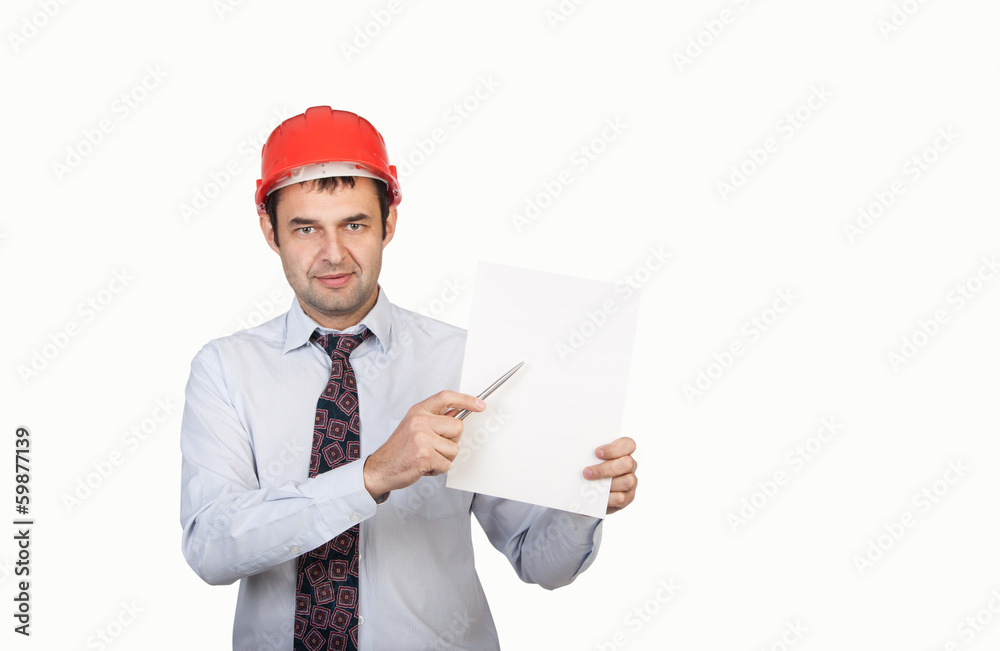man engineer in a red helmet shows his pen man engineer in a red helmet shows his pen