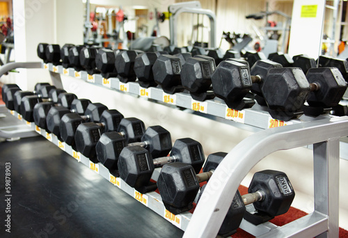 Rows of dumbbells on the rack