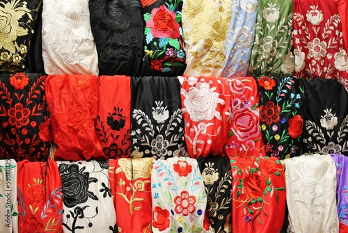 Fotografie flamenco shawl market display rows Spain Spanish textile traditional embroidery