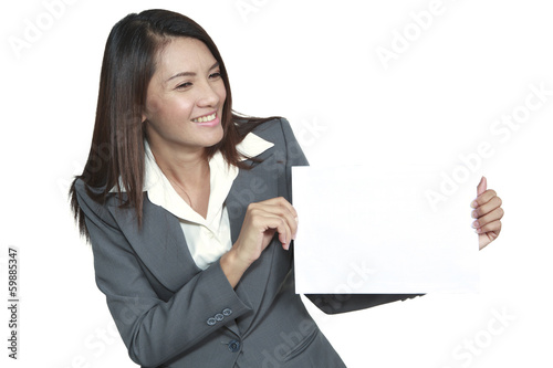 Young Asian business woman attractive brunetee showing blank sig photo