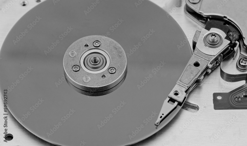 Open computer hard drive on white background Open computer hard drive on white background