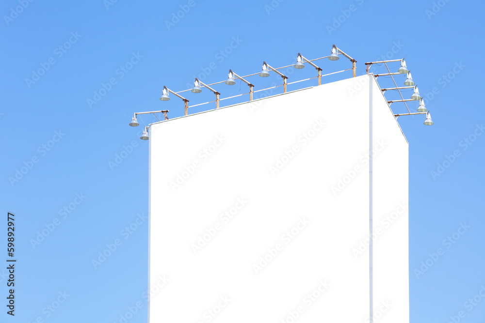 Obraz premium Billboard with empty screen, against blue cloudy sky