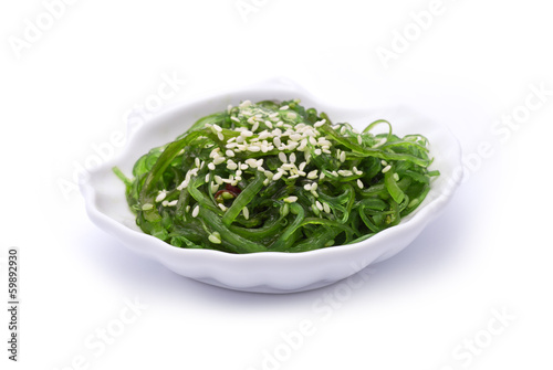 Hiyashi Wakame on shell-shaped dish isolated on white