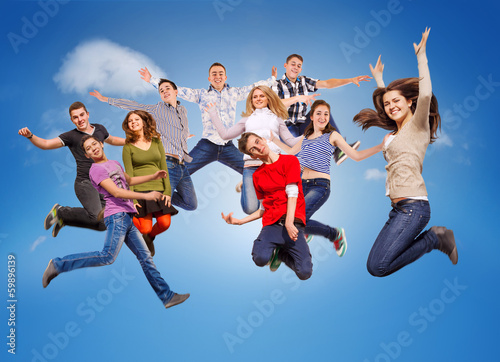 Happy jumping teenagers