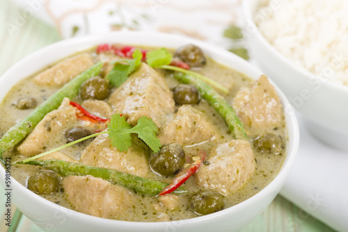 Thai green chicken curry with baby aubergines served with rice