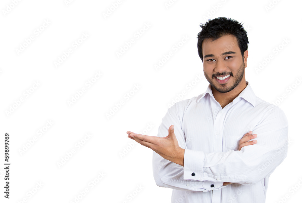 Excited smiling man pointing at a copy space Excited smiling man pointing at a copy space