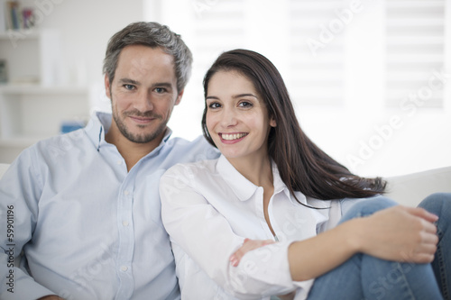 Couple at home relaxing in sofa © jackfrog