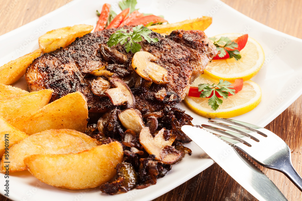 Fried pork chop with mushrooms Fried pork chop with mushrooms