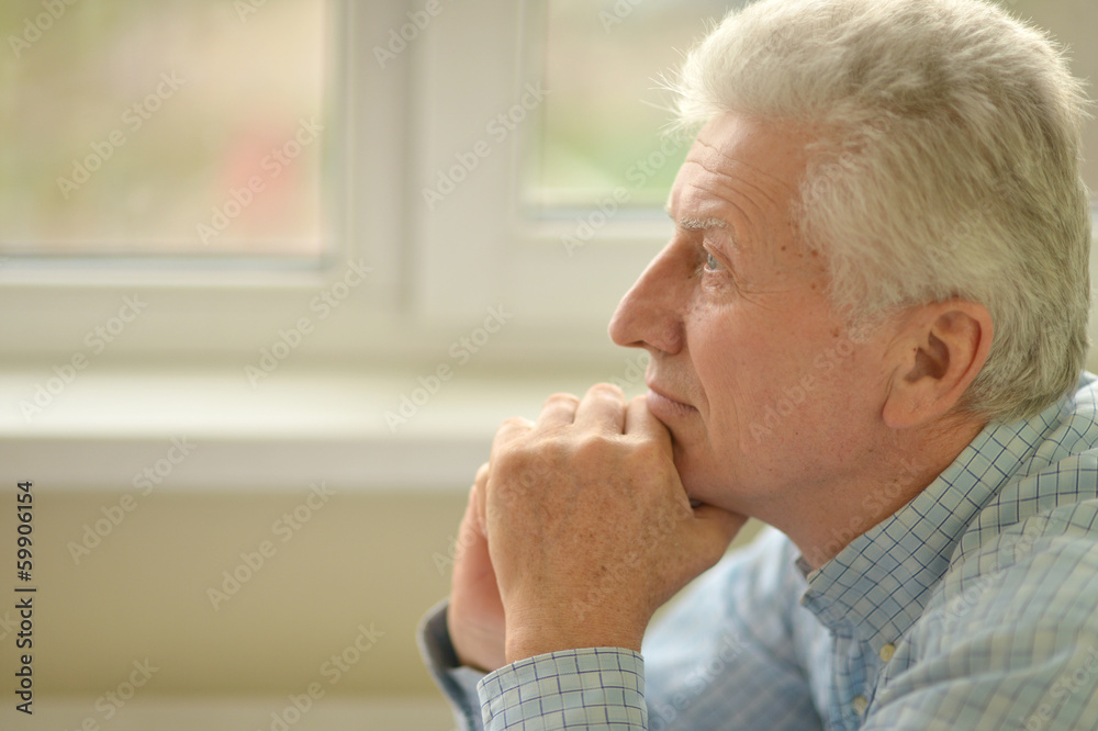 Caucasian elderly man at home Caucasian elderly man at home