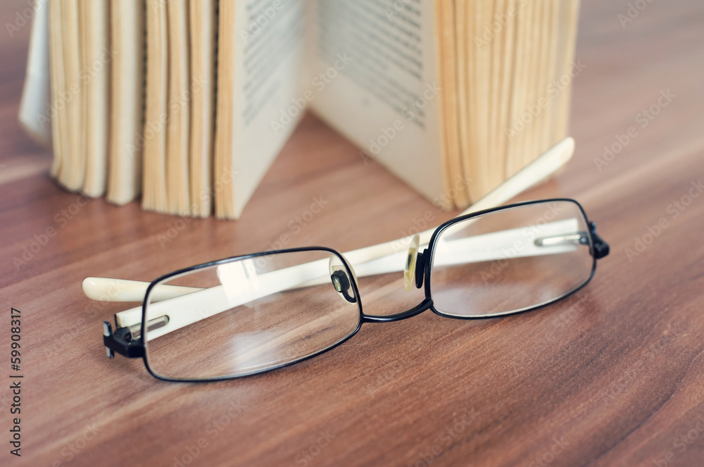 glasses and book