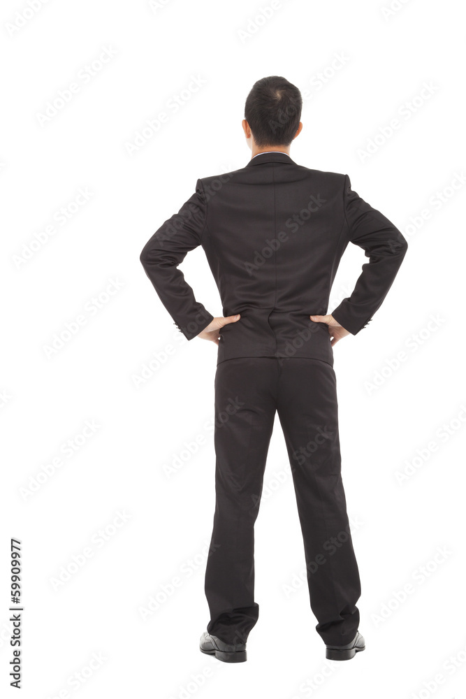 businessman standing and put hand on waist. businessman standing and put hand on waist.