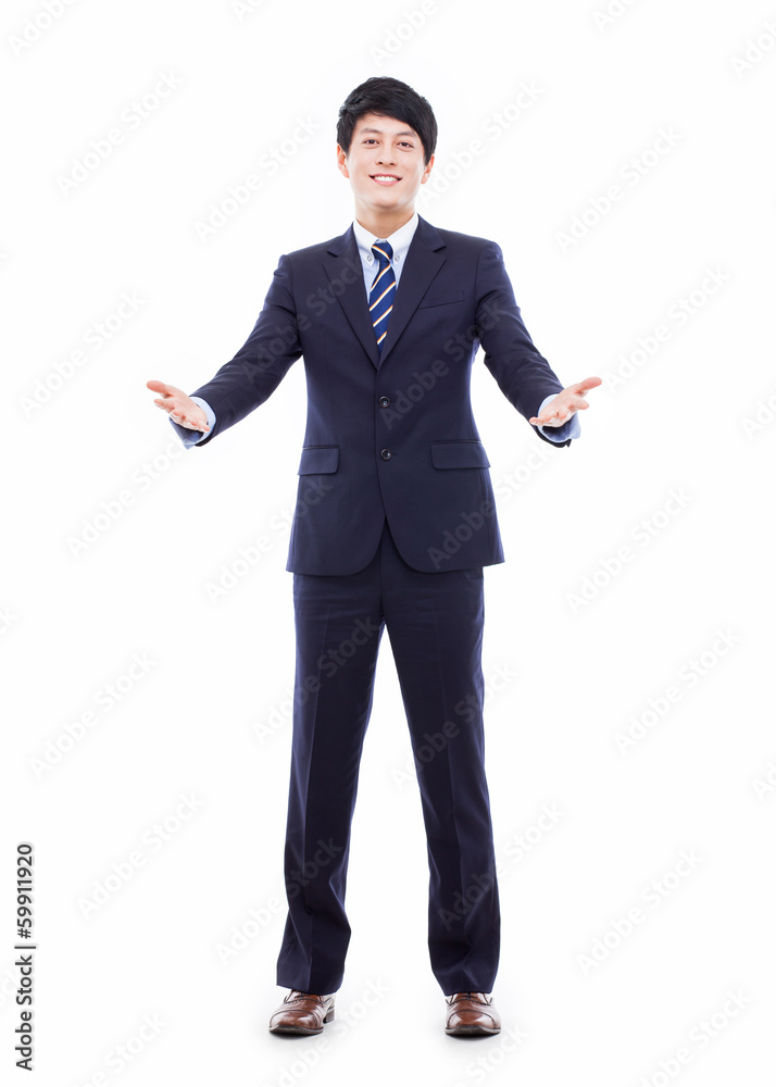 Young Asian business man showing welcom sign. Young Asian business man showing welcom sign.