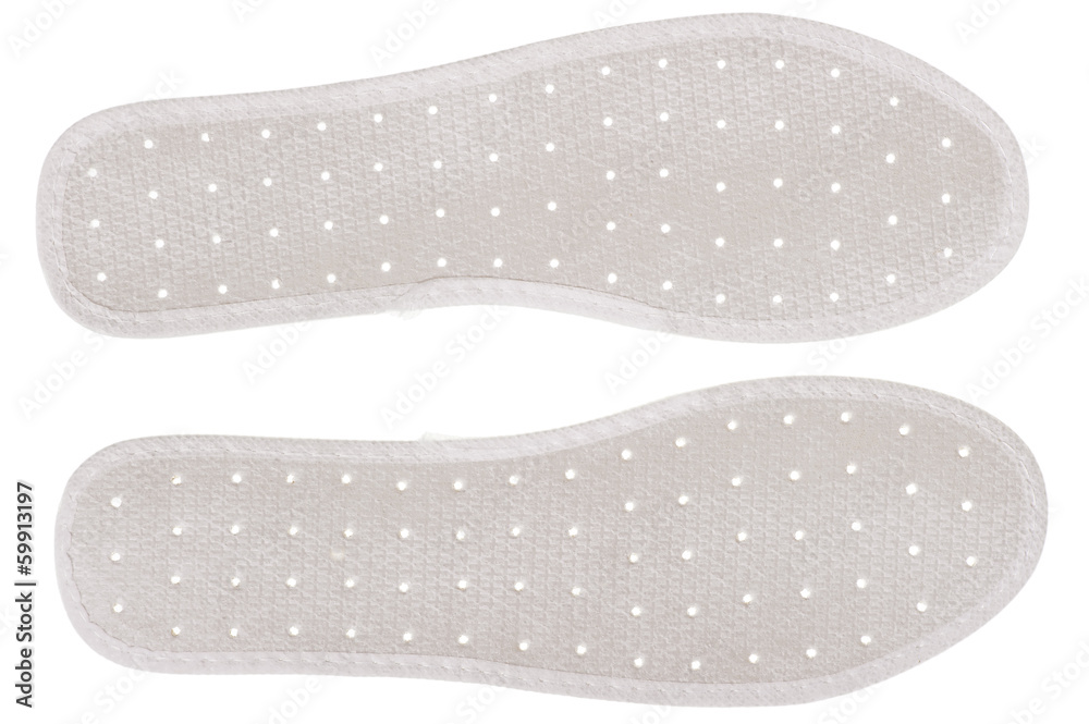 pair of insoles for shoes with holes for ventilation Stock Photo | Adobe  Stock