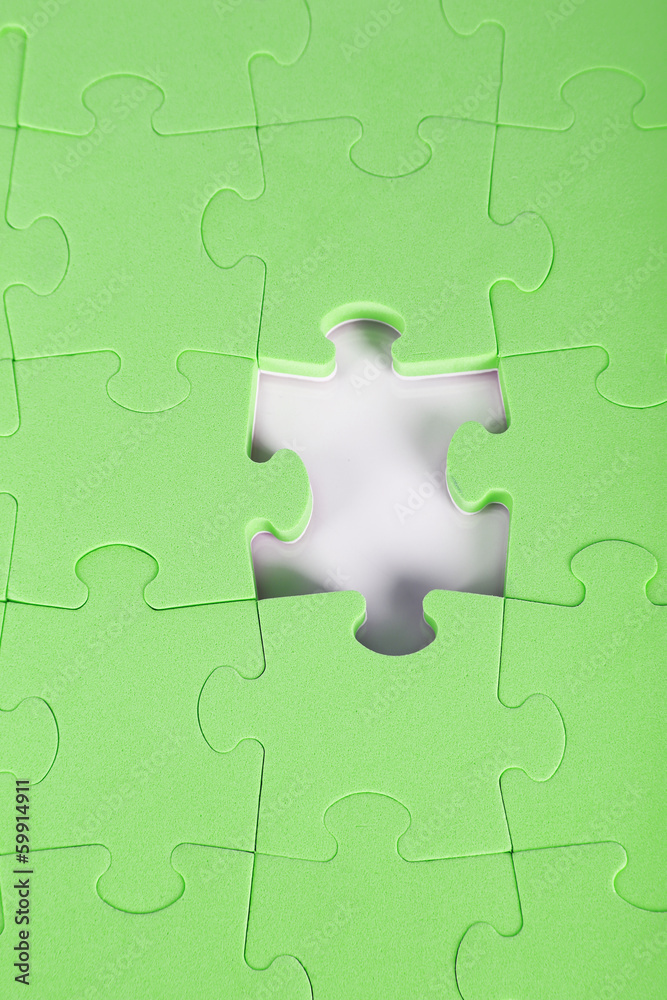 Last piece of jigsaw puzzle, close-up Last piece of jigsaw puzzle, close-up