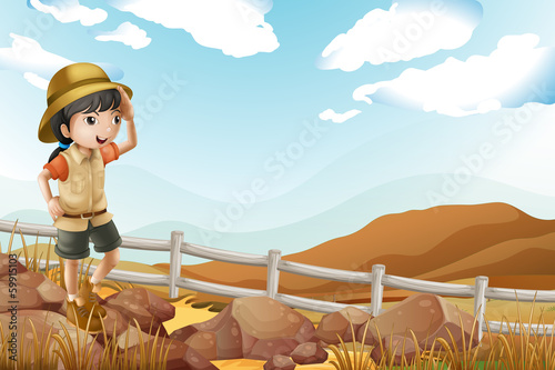 A young female explorer walking alone