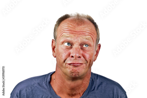 Astonished looking man on a white background