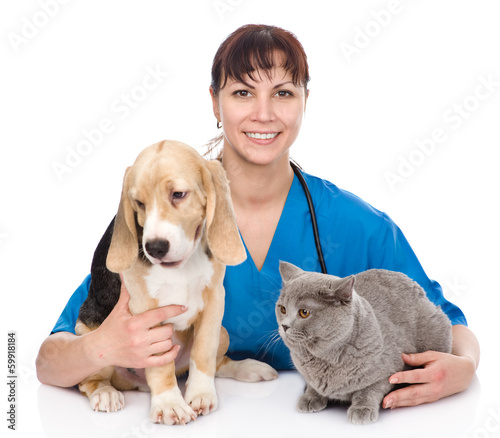 veterinarian hugging cat and dog. isolated on white background