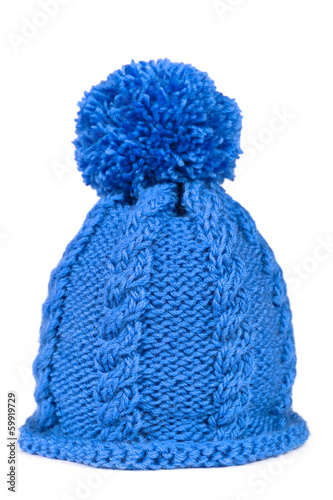 Knitted hat with a pompon