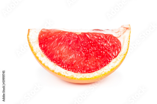 Slice of ripe grapefruit