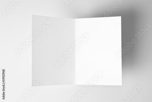 Blank open card over grey background