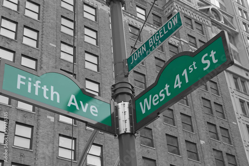 Street signs for John Bigelow Plaza in NYC