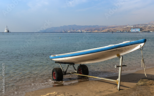 Fototapeta Naklejka Na Ścianę i Meble -  Lifeguard boat at the golden beach in Eilat