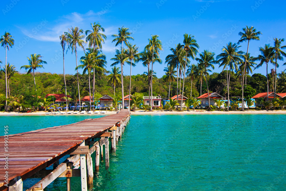 Tropical Resort.  boardwalk on beach