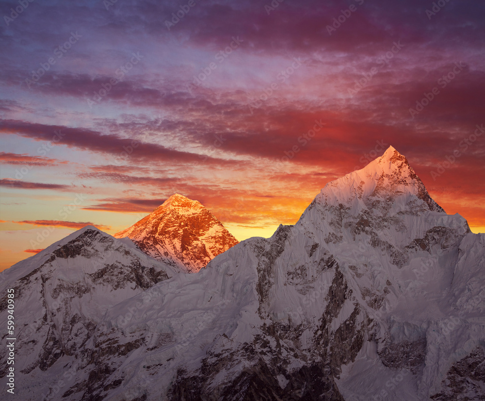 Golden pyramid of Mount Everest (8848 m) at sunset.