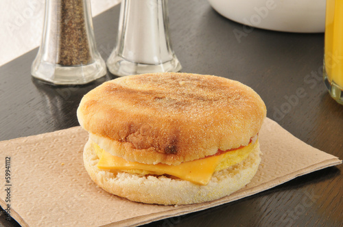 English muffin with ham, egg and cheese