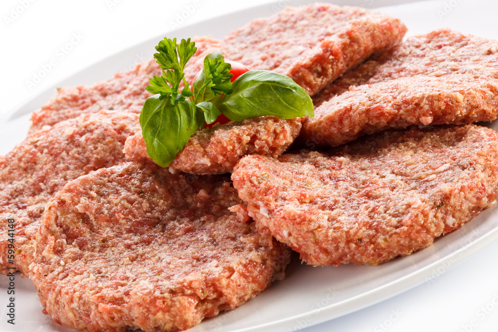 Raw minced pork chops meat on white background Raw minced pork chops meat on white background