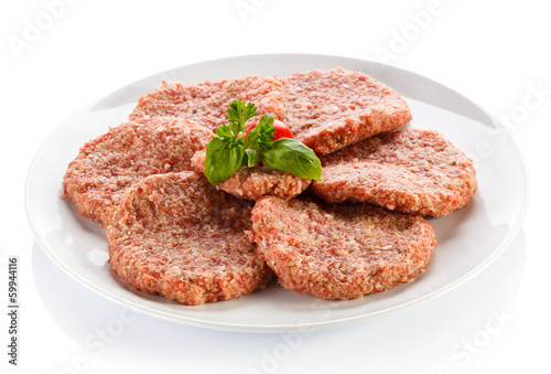 Raw minced pork chops meat on white background