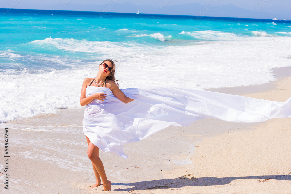 Beautiful Girl With White fabric on The Beach. Beautiful Girl With White fabric on The Beach.