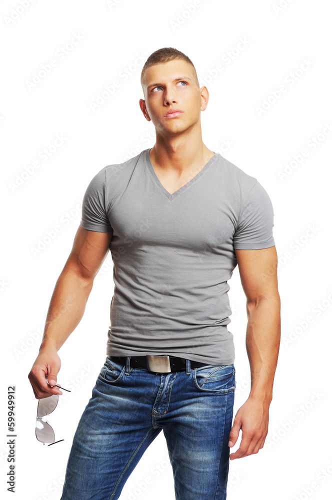 Handsome macho man posing in sunglasses Handsome macho man posing in sunglasses